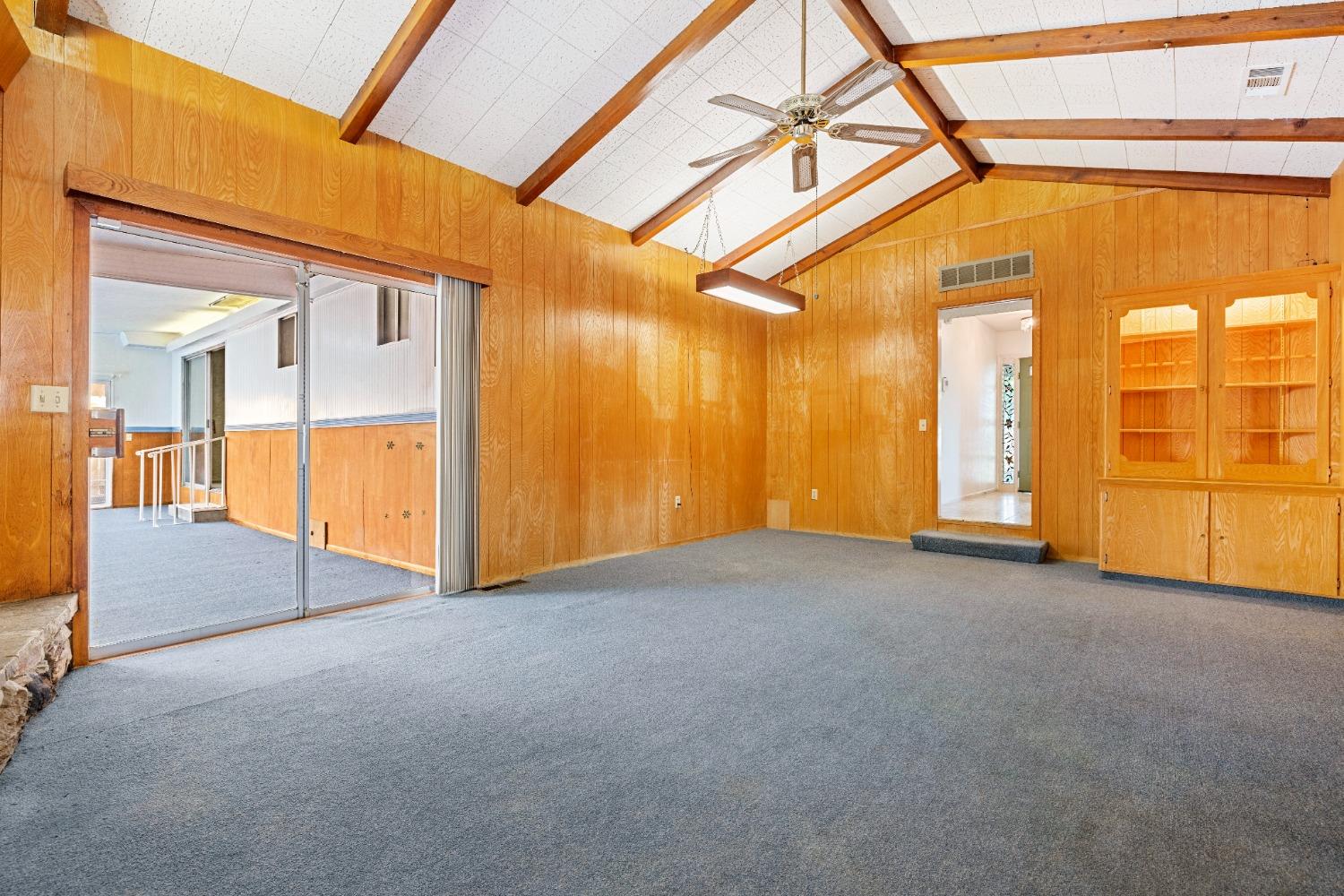 100 Hilton Street Madera, CA 93637 - Photo 16 of 30 a view of an empty room with a fireplace