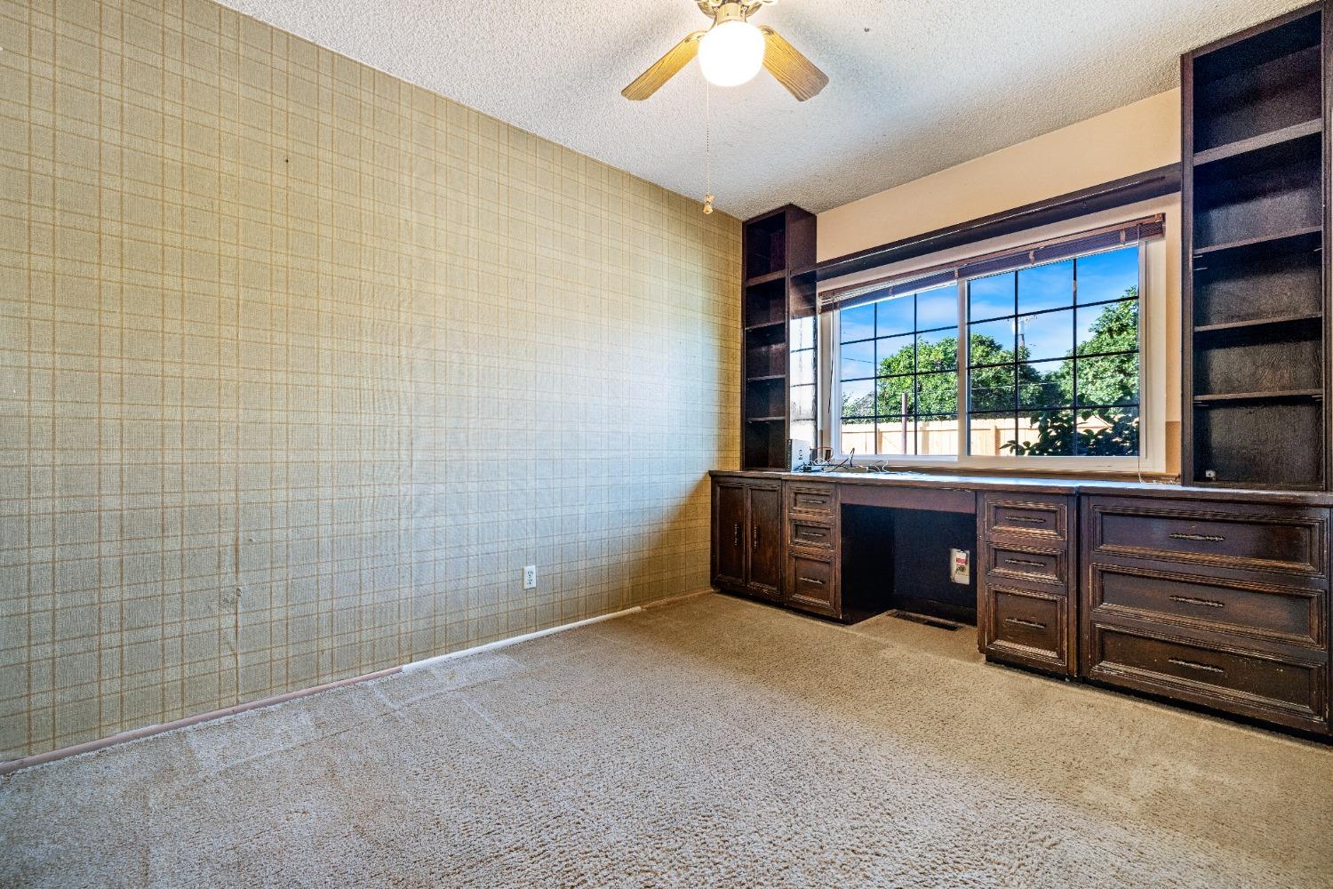 100 Hilton Street Madera, CA 93637 - Photo 23 of 30 a view of an empty room with a window
