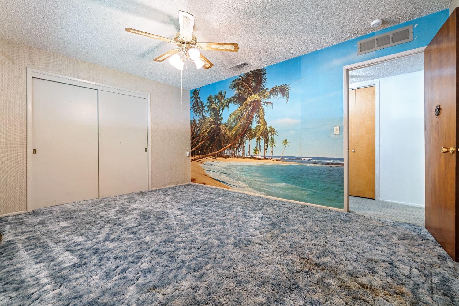 100 Hilton Street Madera, CA 93637 - Photo 10 of 30 a view of a livingroom with a staircase