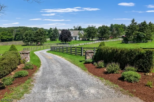 a view of a garden with a building in the background