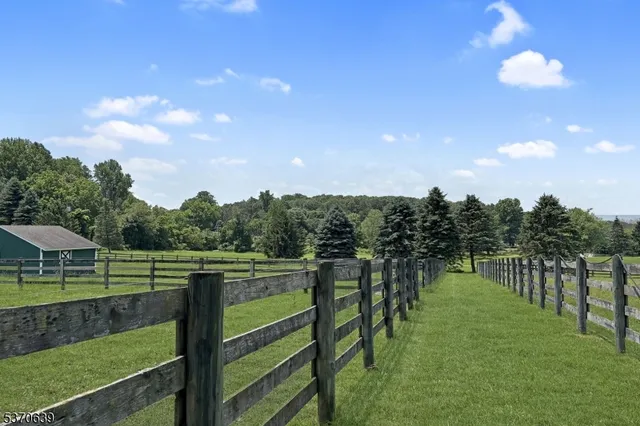a view of a golf course with chairs