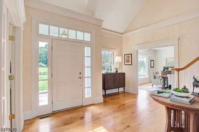 a view of a livingroom with furniture and wooden floor