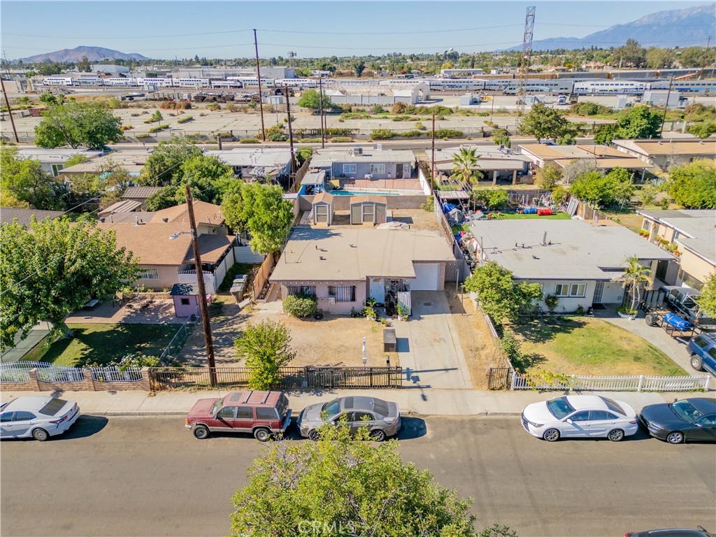 1709 Rialto Avenue Colton, CA 92324 - Photo 2 of 26 an aerial view of a swimming pool and outdoor space