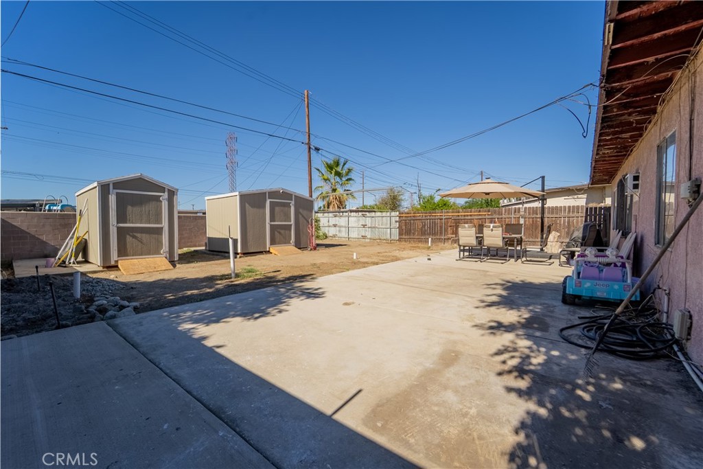 1709 Rialto Avenue Colton, CA 92324 - Photo 24 of 26 a view of a backyard with sitting area