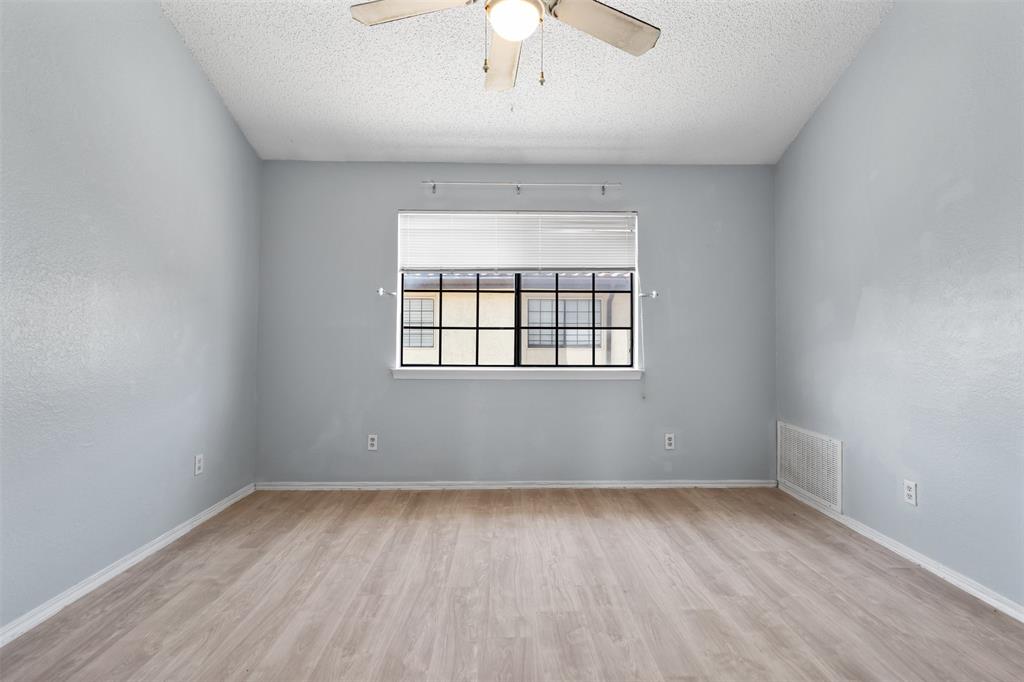 5590 Spring Valley Road, Unit H 203 Dallas, TX 75254 - Photo 17 of 27 Light wood-finish flooring throughout