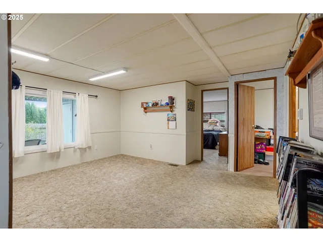 a view of a livingroom with furniture