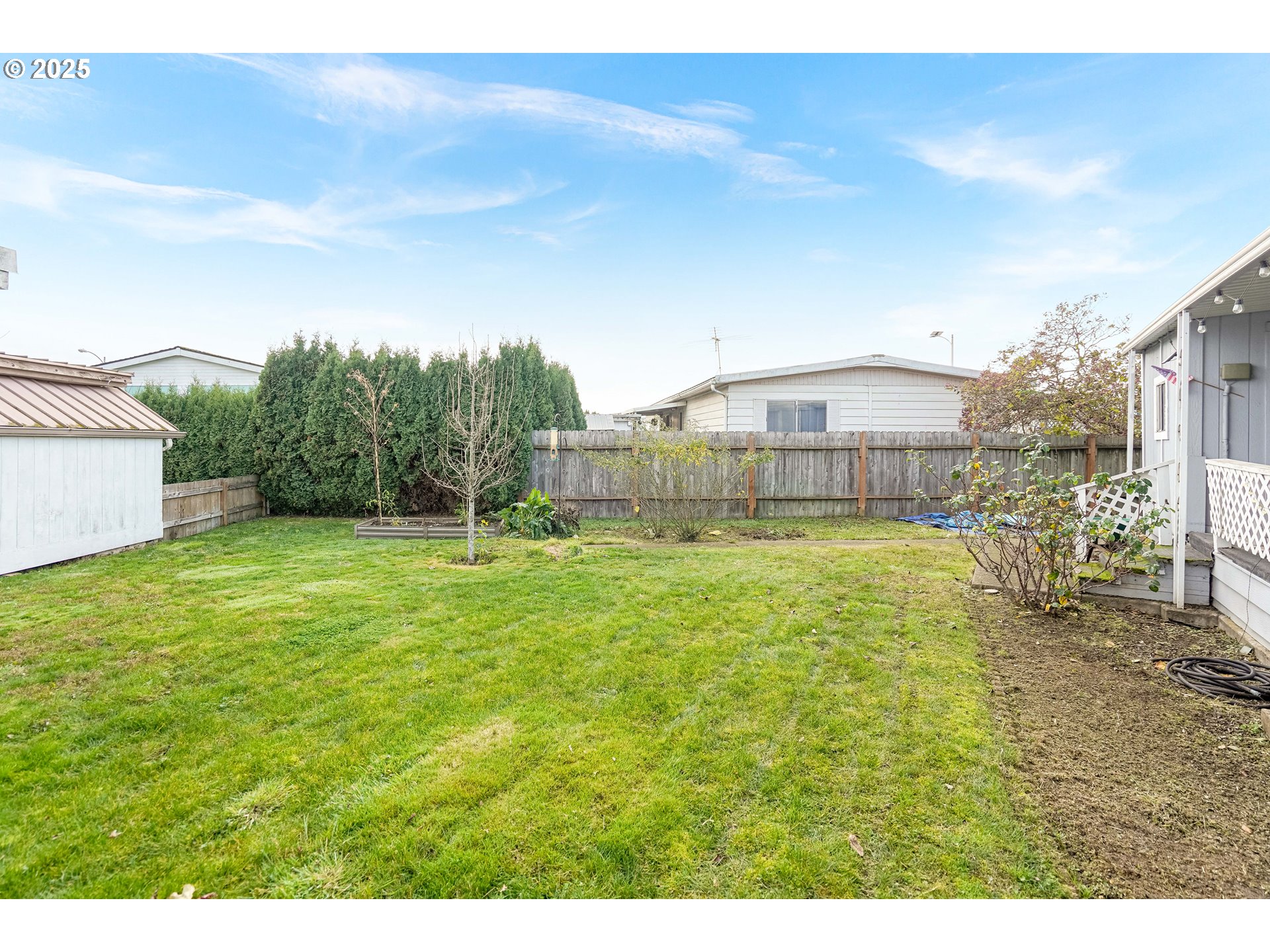5422 Portland Road Northeast, Unit 56 Salem, OR 97305 - Photo 32 of 38 a view of a house with a outdoor space