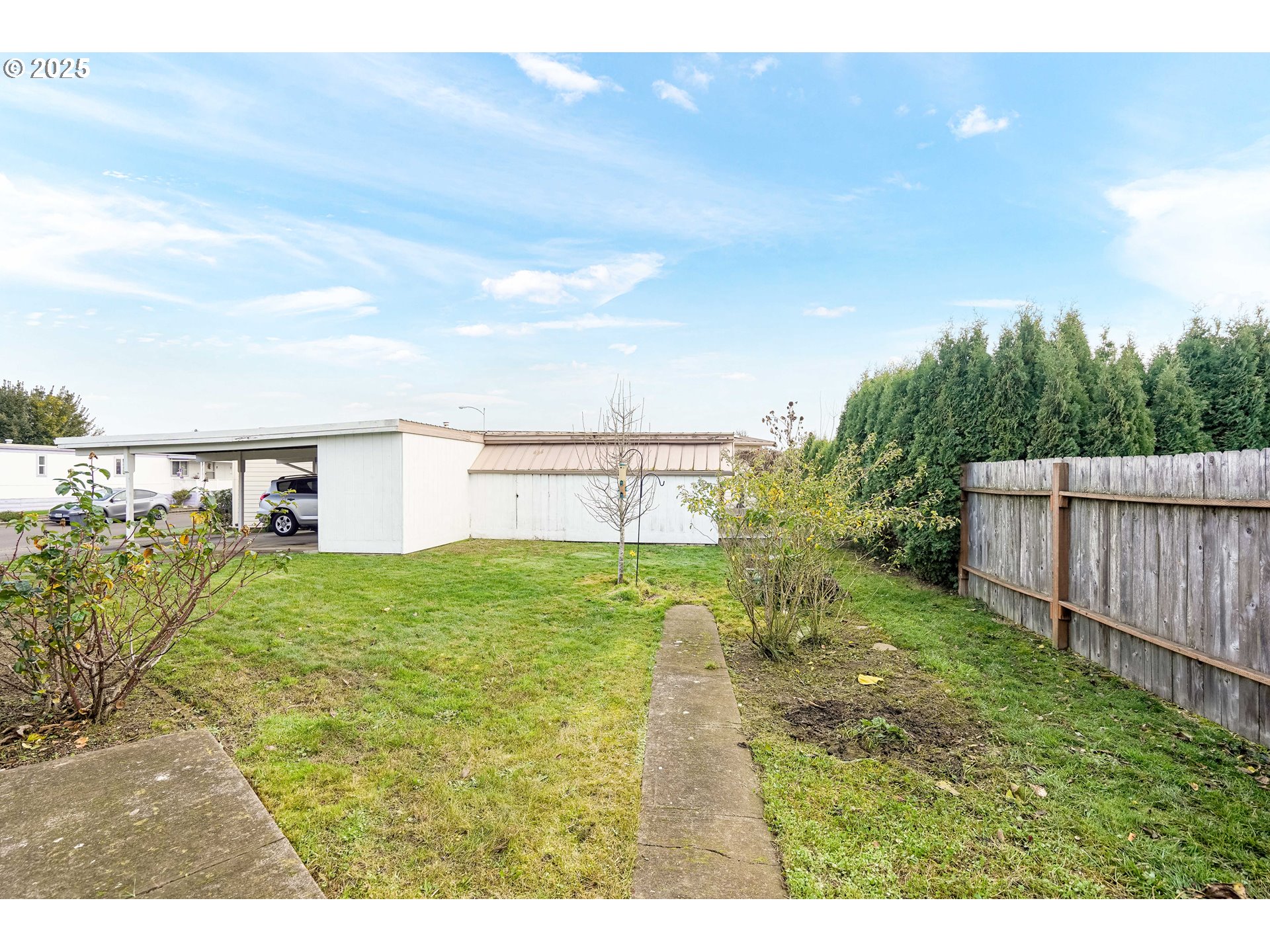 5422 Portland Road Northeast, Unit 56 Salem, OR 97305 - Photo 35 of 38 a view of a backyard