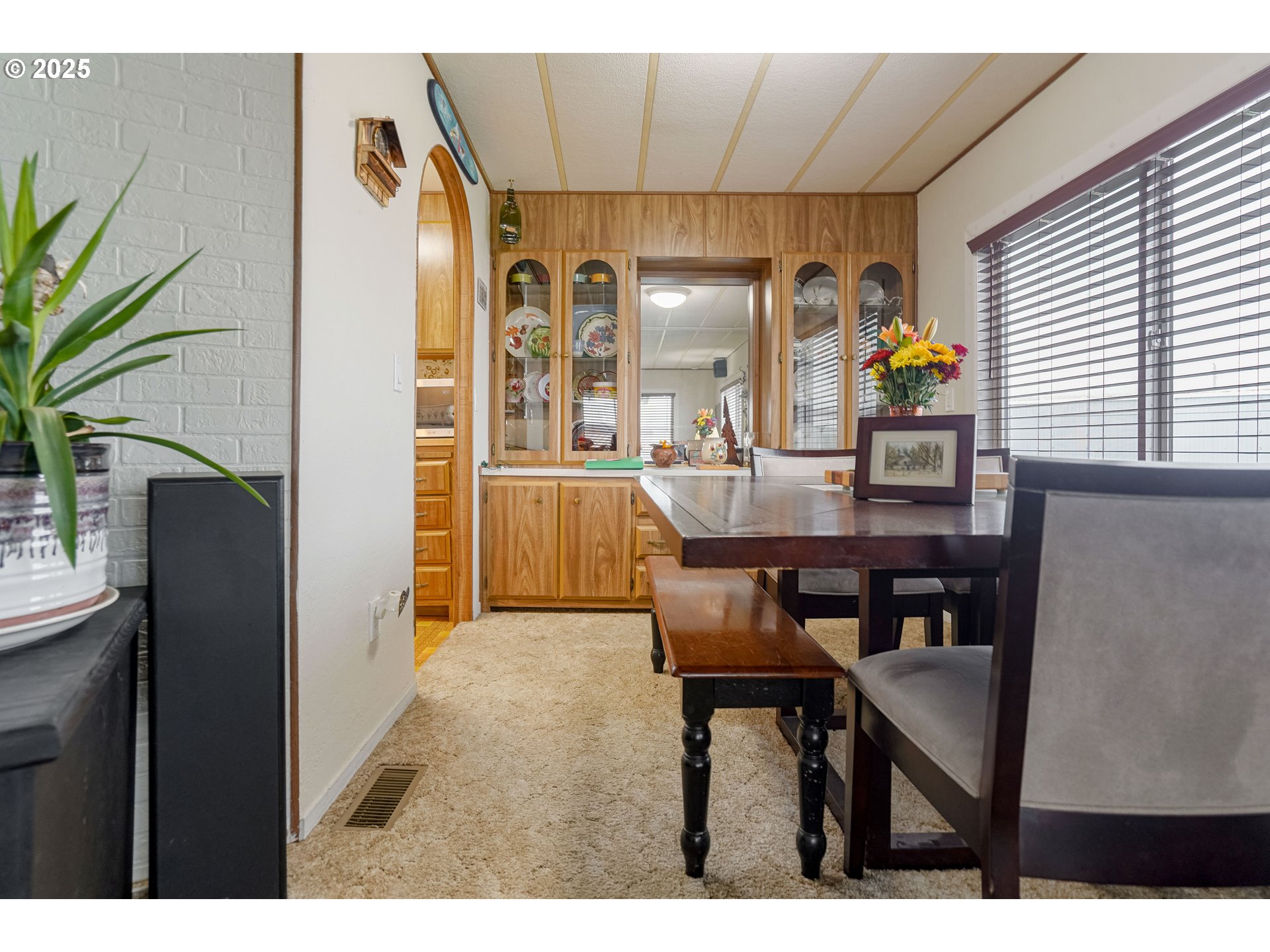 5422 Portland Road Northeast, Unit 56 Salem, OR 97305 - Photo 10 of 38 a dining room with furniture and window