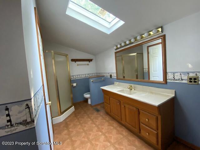 220 Main Street Laceyville, PA 18623 - Photo 11 of 39 a bathroom with a sink mirror vanity and toilet