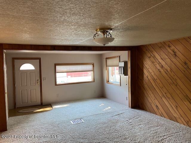 220 Main Street Laceyville, PA 18623 - Photo 2 of 39 a view of an empty room with a window