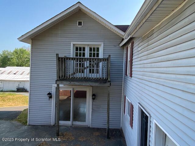220 Main Street Laceyville, PA 18623 - Photo 28 of 39 a front view of a house with a garden