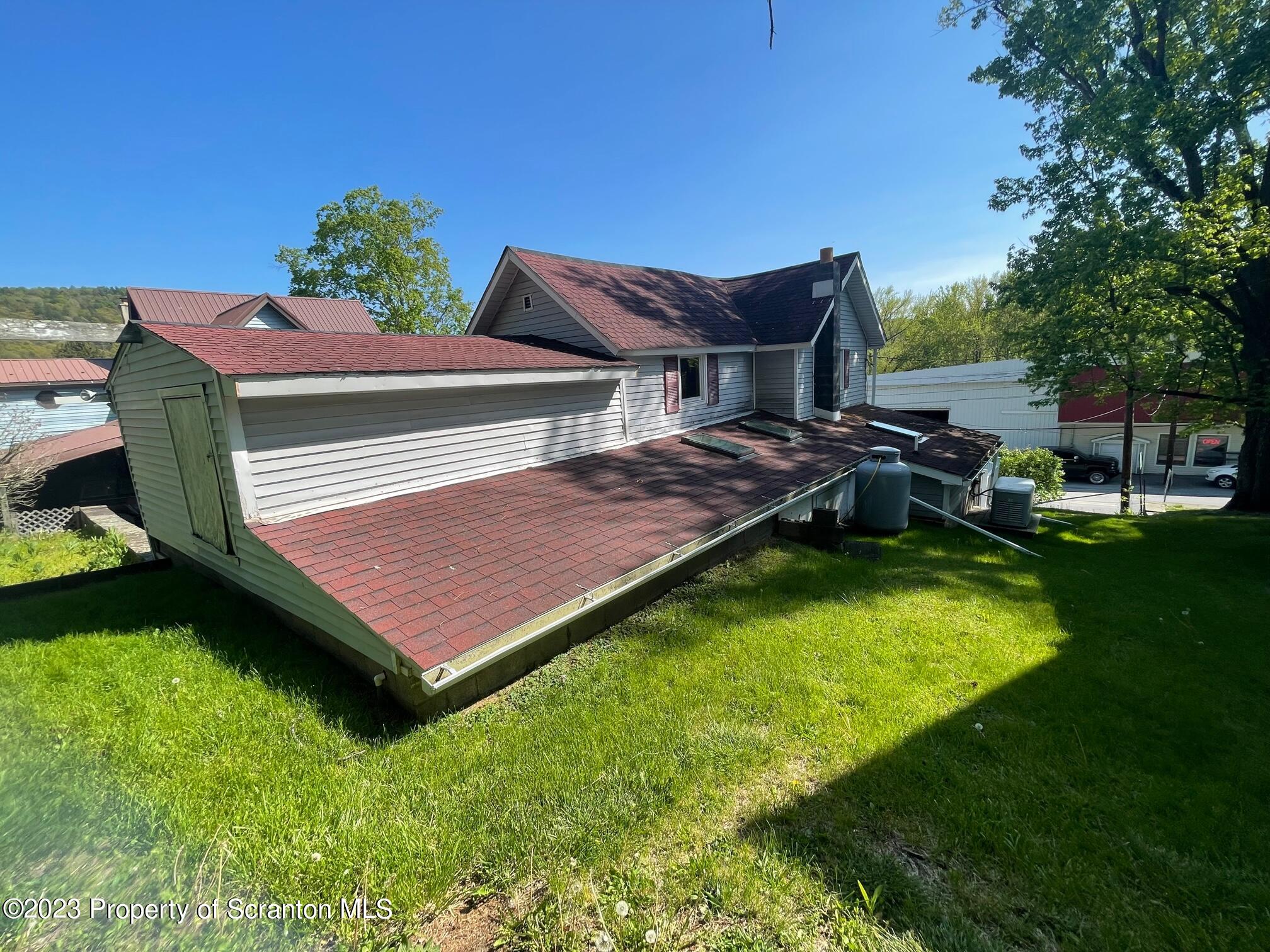 220 Main Street Laceyville, PA 18623 - Photo 31 of 39 a view of a backyard with sitting area