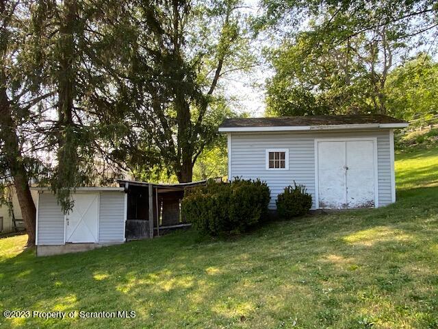 220 Main Street Laceyville, PA 18623 - Photo 34 of 39 a view of a house with a yard