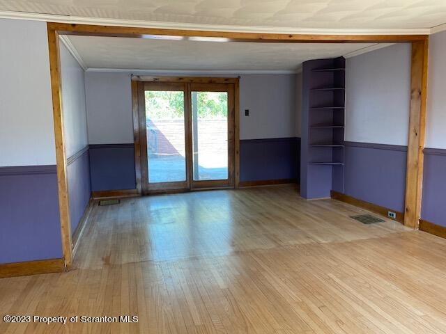 220 Main Street Laceyville, PA 18623 - Photo 5 of 39 a view of empty room with wooden floor and fan