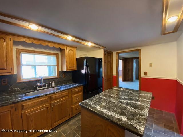 220 Main Street Laceyville, PA 18623 - Photo 6 of 39 a kitchen with stainless steel appliances granite countertop sink stove and refrigerator