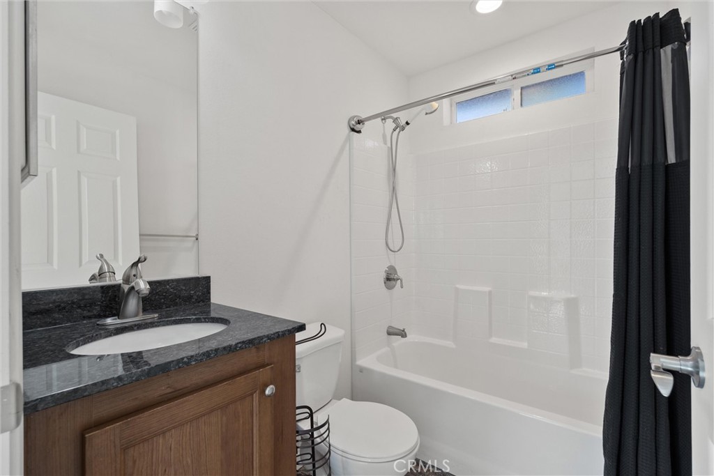 6328 Diamond Paradise, CA 95969 - Photo 20 of 31 a bathroom with a granite countertop sink toilet and shower