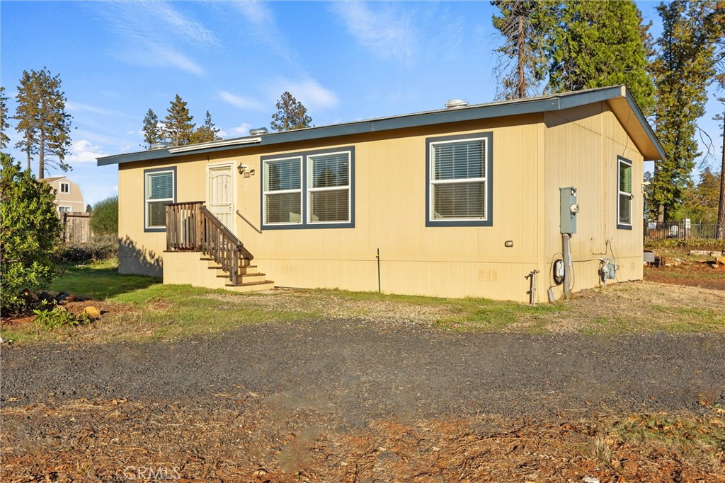 6328 Diamond Paradise, CA 95969 - Photo 2 of 31 a view of a house with a backyard