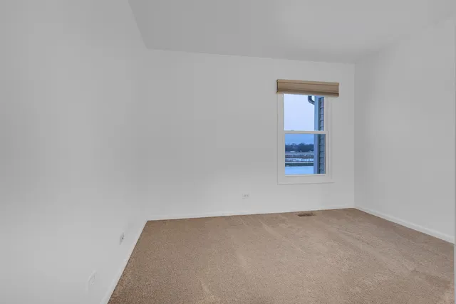 an empty room with a natural light