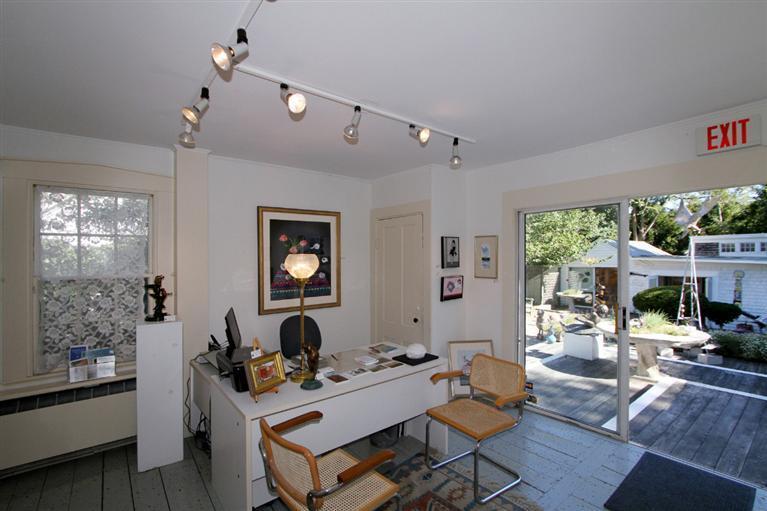 40 Main Street Wellfleet, MA 02667 - Photo 21 of 35 a living room with furniture and a large window