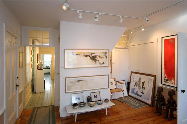 40 Main Street Wellfleet, MA 02667 - Photo 28 of 35 a view of a hallway with wooden floor and furniture