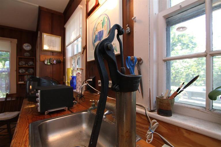 40 Main Street Wellfleet, MA 02667 - Photo 31 of 35 a living room with furniture and a window
