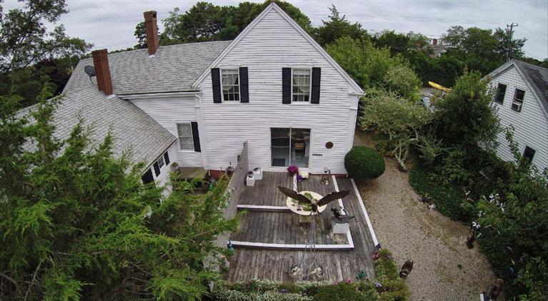 40 Main Street Wellfleet, MA 02667 - Photo 32 of 35 a view of a back yard of the house