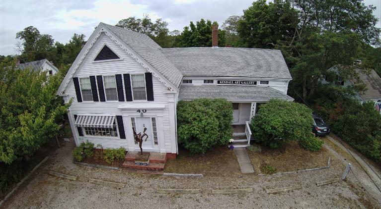 40 Main Street Wellfleet, MA 02667 - Photo 33 of 35 front view of a house with a yard