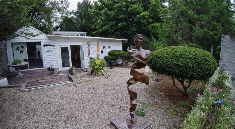 40 Main Street Wellfleet, MA 02667 - Photo 35 of 35 a view of a house with backyard and sitting area