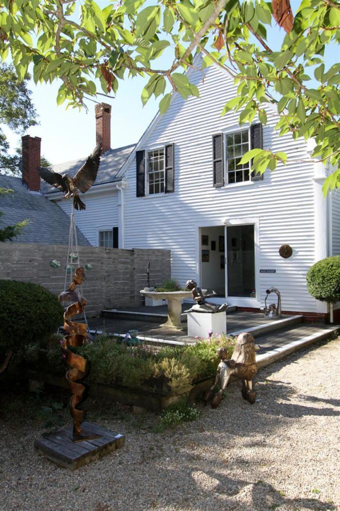 40 Main Street Wellfleet, MA 02667 - Photo 7 of 35 a view of a house with backyard porch and sitting area