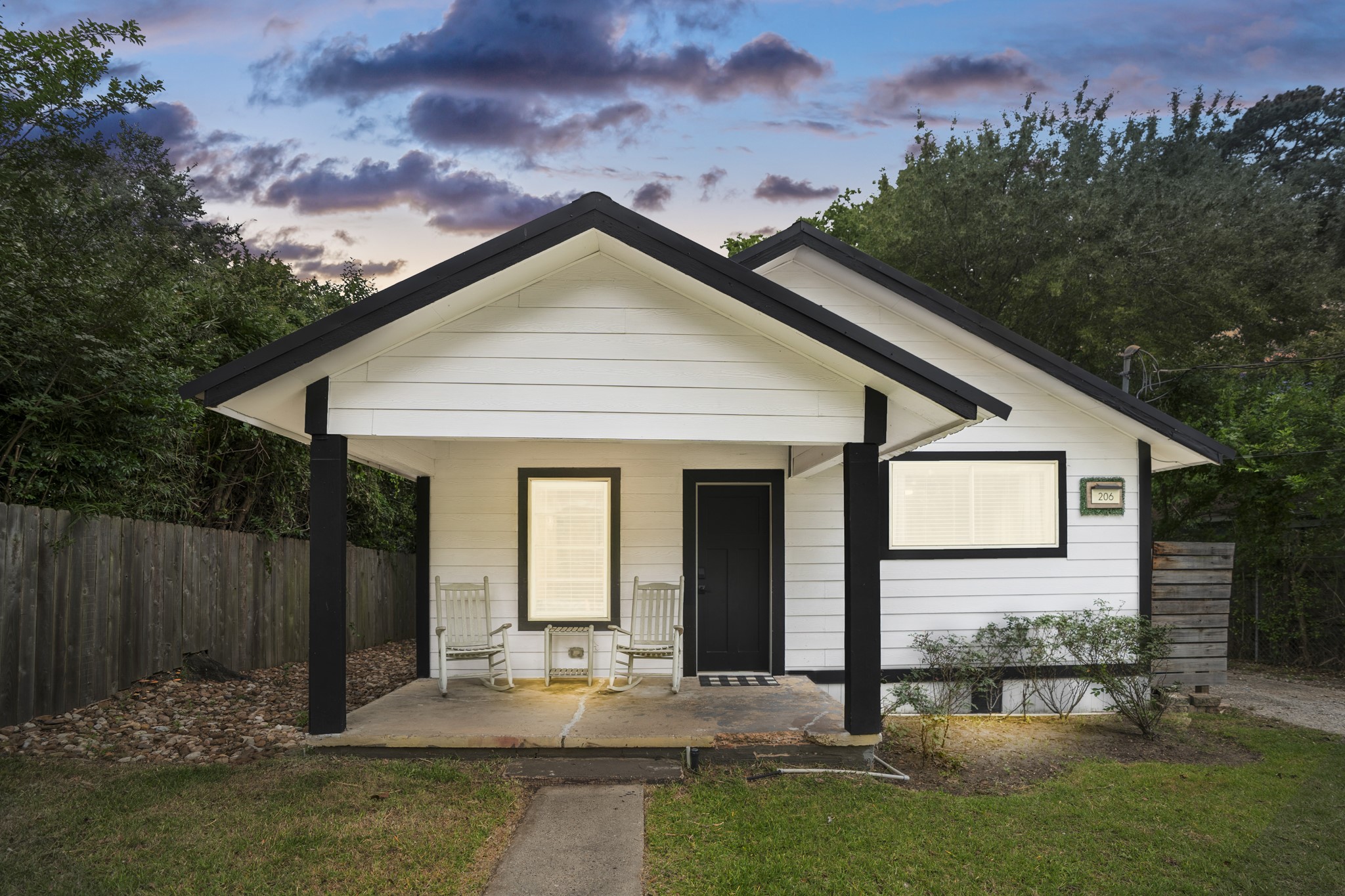 206 Murray Street Conroe, TX 77301 - Photo 1 of 38 a view of a house with backyard and garden