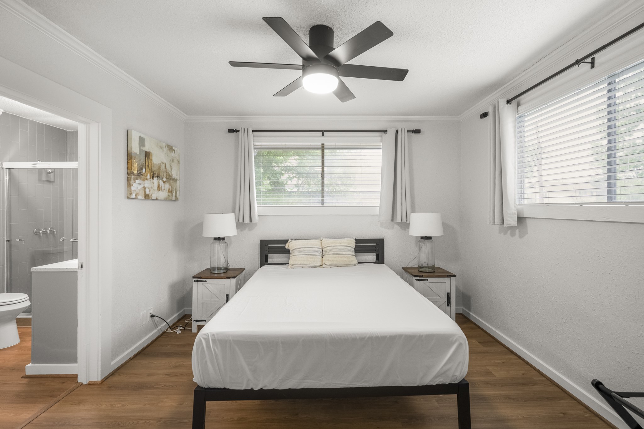 206 Murray Street Conroe, TX 77301 - Photo 12 of 38 a bedroom with a bed and a window