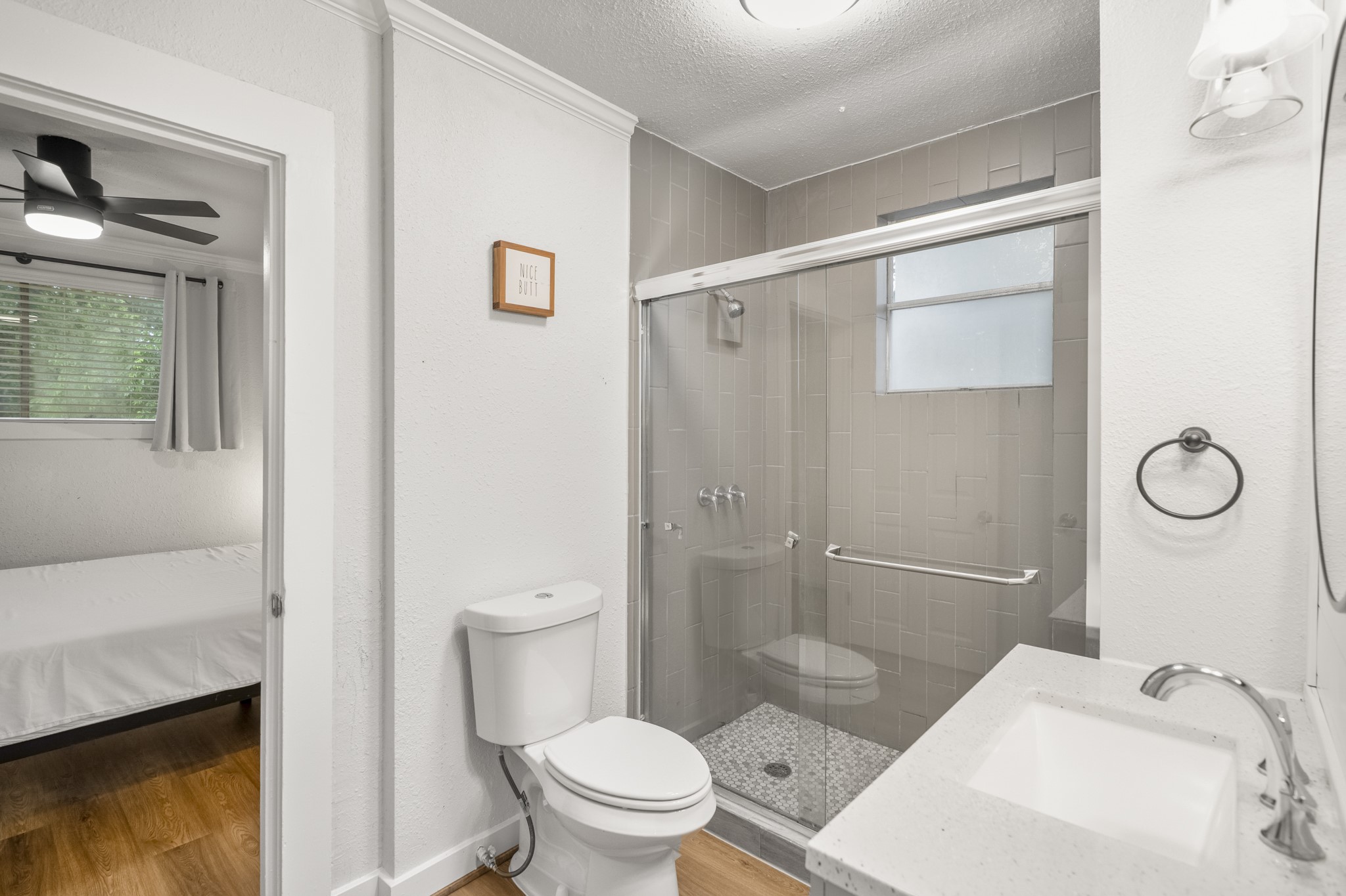 206 Murray Street Conroe, TX 77301 - Photo 15 of 38 a bathroom with a sink toilet and shower