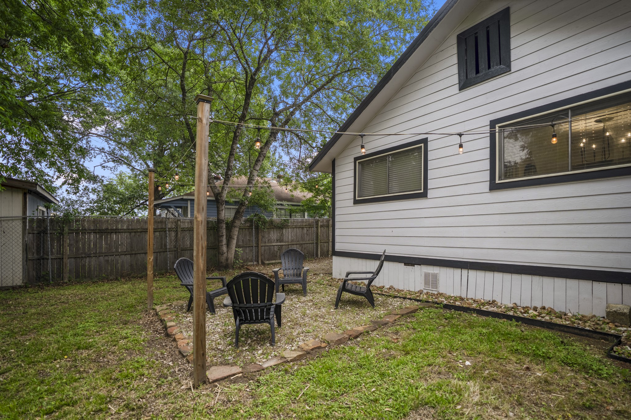 206 Murray Street Conroe, TX 77301 - Photo 33 of 38 a view of a backyard with furniture and a backyard