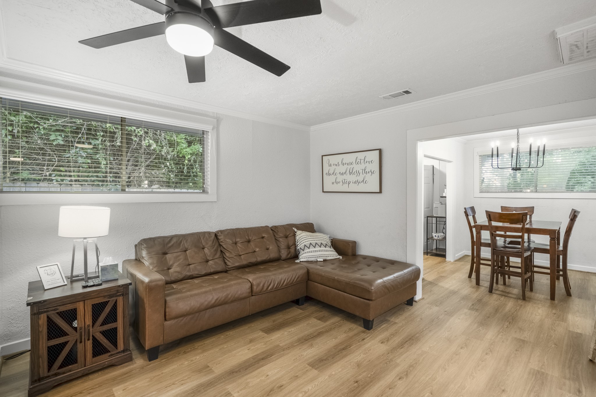 206 Murray Street Conroe, TX 77301 - Photo 10 of 38 a living room with furniture and a large window