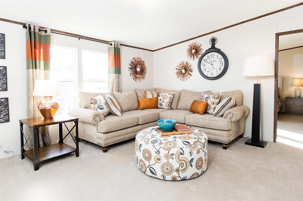 107 Valley Street Bridgeport, TX 76426 - Photo 5 of 9 a living room with furniture and a large window
