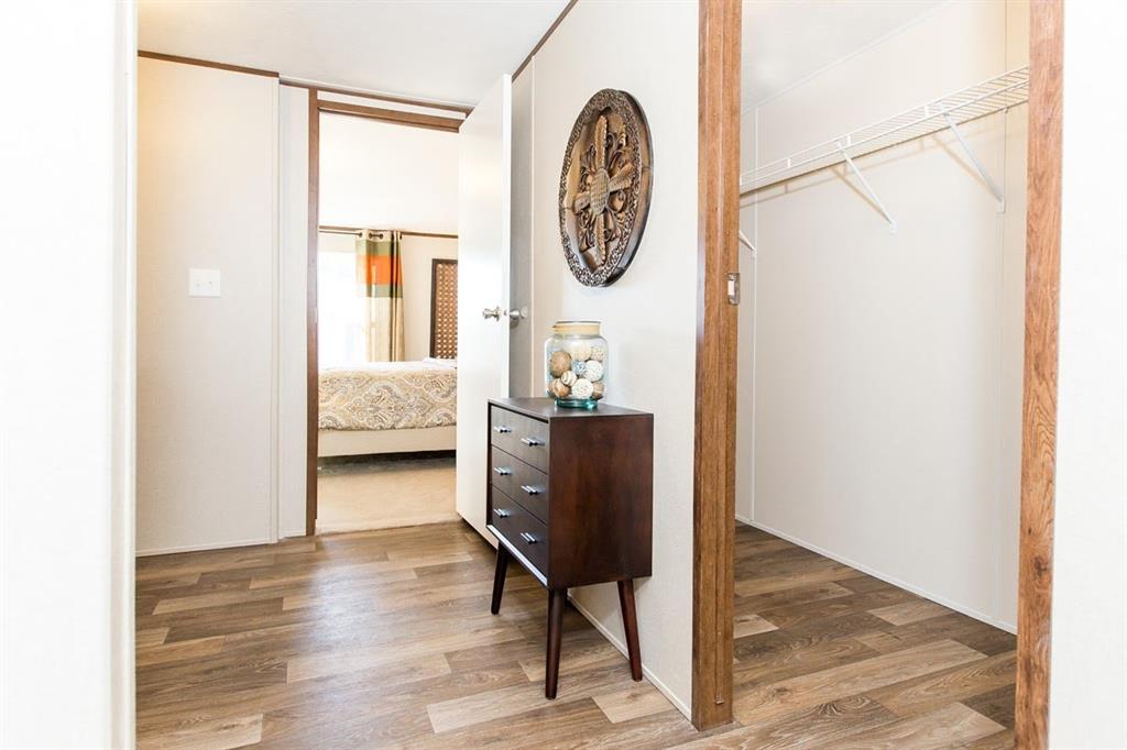 107 Valley Street Bridgeport, TX 76426 - Photo 7 of 9 a living room with furniture and a window