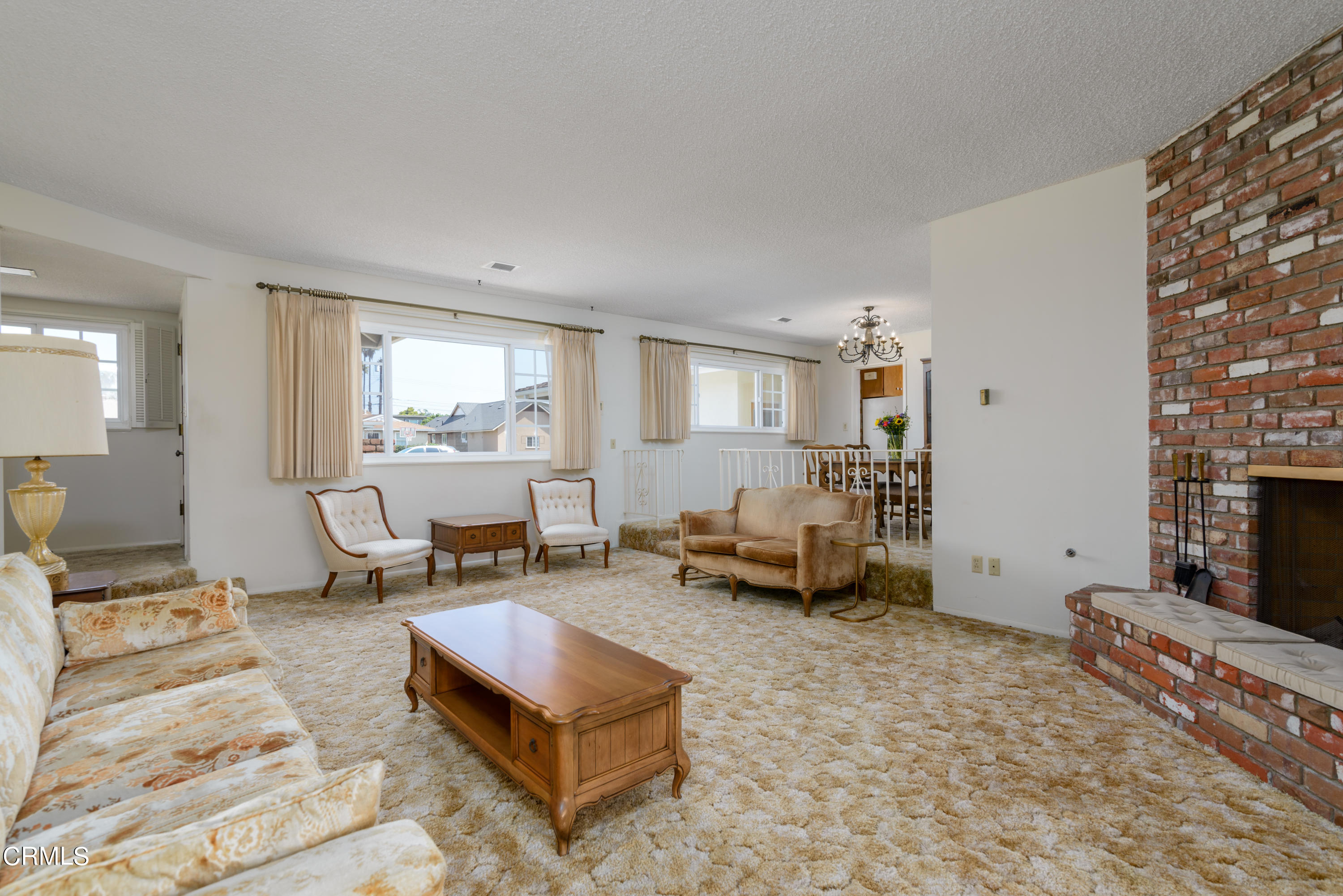 1126 West Roderick Avenue Oxnard, CA 93030 - Photo 3 of 28 a living room with furniture and a fireplace