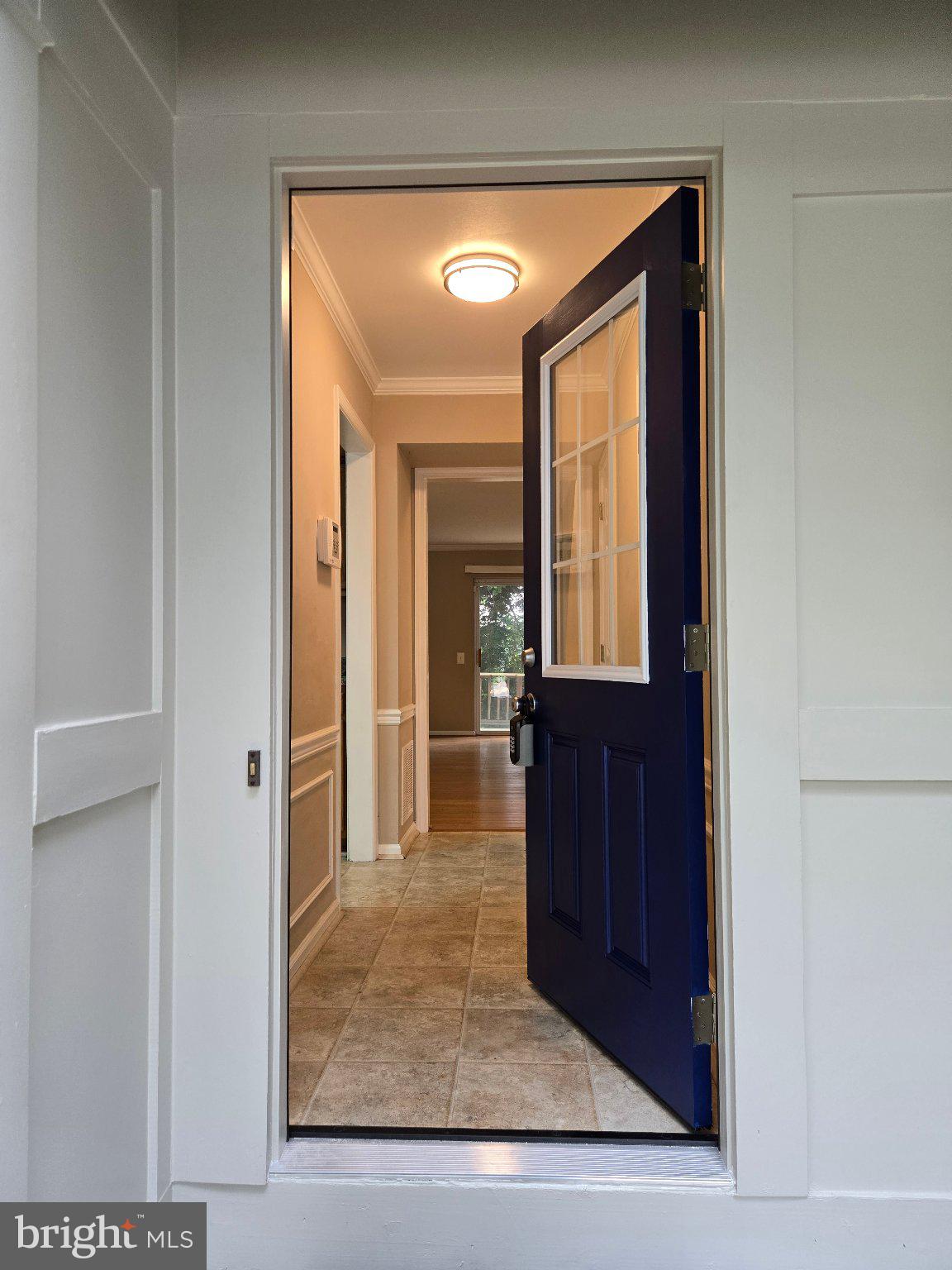 1765 Rochelle Court Woodbridge, VA 22192 - Photo 2 of 34 Welcoming entry with vibrant blue door.