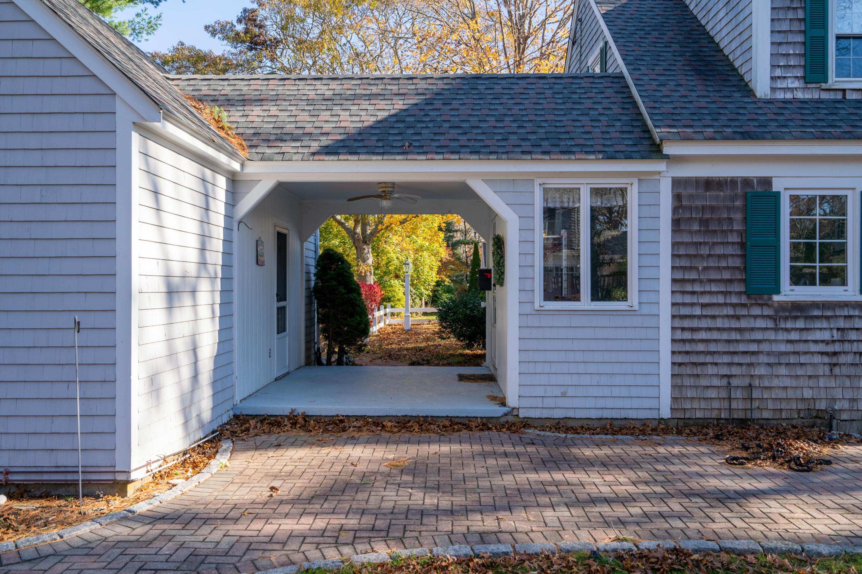 69 Blanid Road Osterville, MA 02655 - Photo 3 of 27 a view of a entryway door of the house
