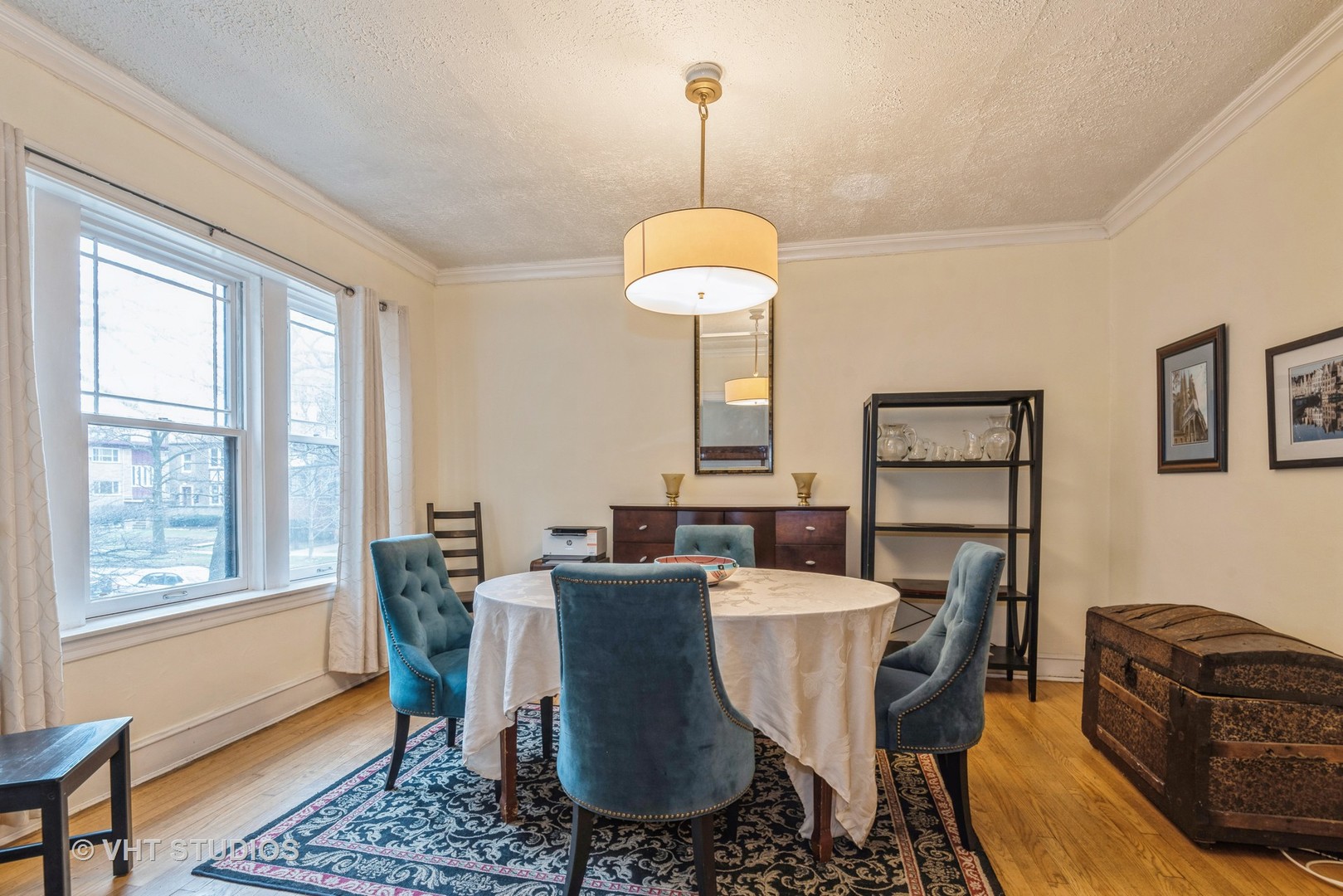 528 Sheridan Road, Unit 1A Evanston, IL 60202 - Photo 6 of 10 a view of a dining room with furniture window and wooden floor