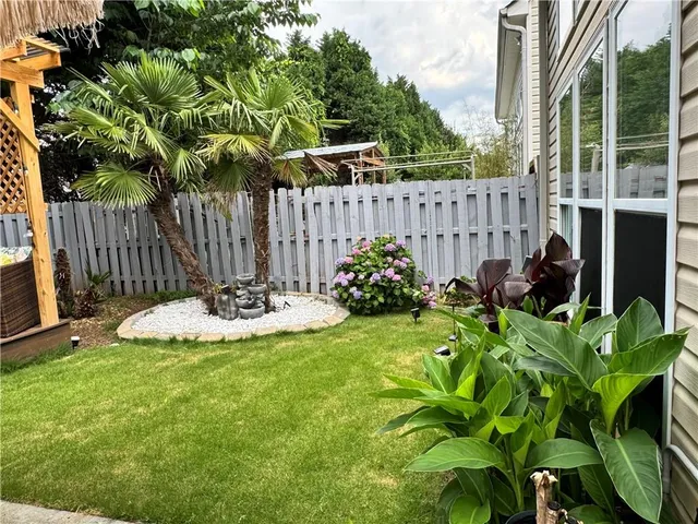 a view of a wooden fence