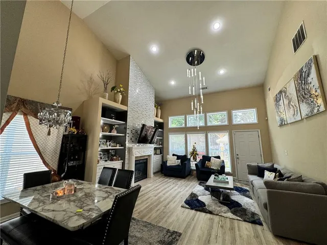 a living room with furniture and a table