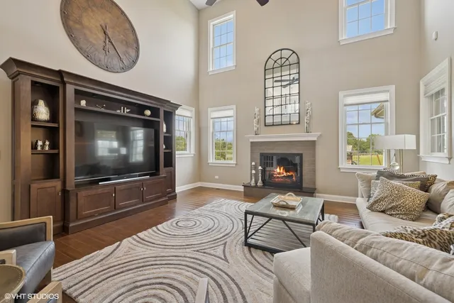 a living room with furniture or couch and a wooden floor