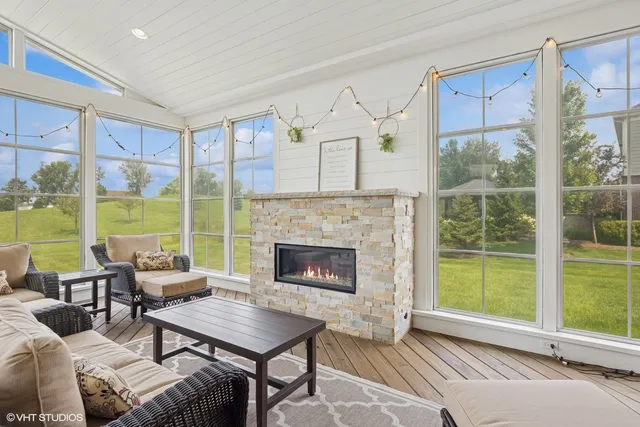 a workspace with furniture and window