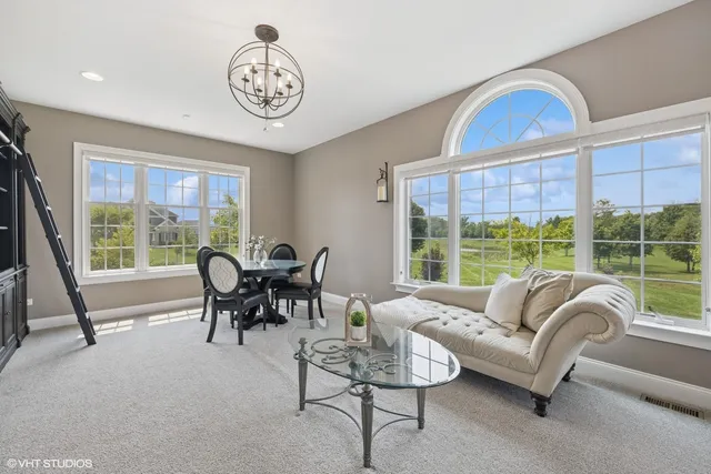 a bathroom with a sink toilet and mirror