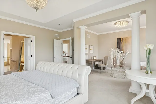 a large bathroom with a double vanity sink large mirror and a bathtub