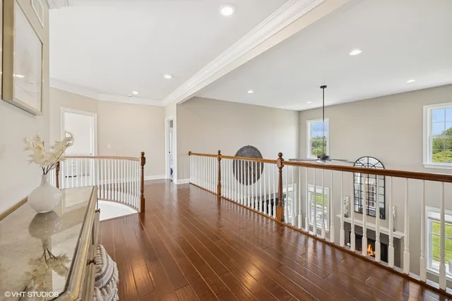 a dining room with furniture and a window