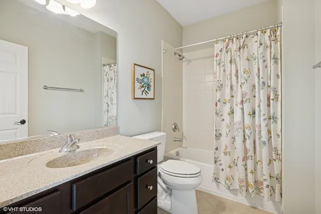 a view of room with furniture and a window