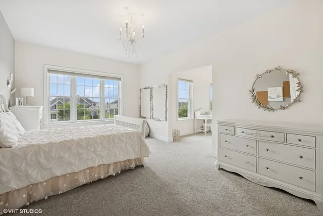 a bathroom with a granite countertop sink toilet and a mirror